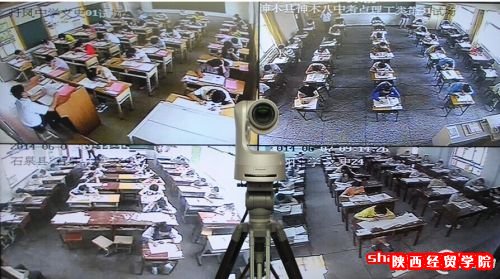 陕西省国家教育考试考务指挥中心监控室的大屏幕上显示全省各地考场情况。2